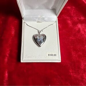 Silver heart locket with blue Swarovski crystal butterfly on  18” chain. New.